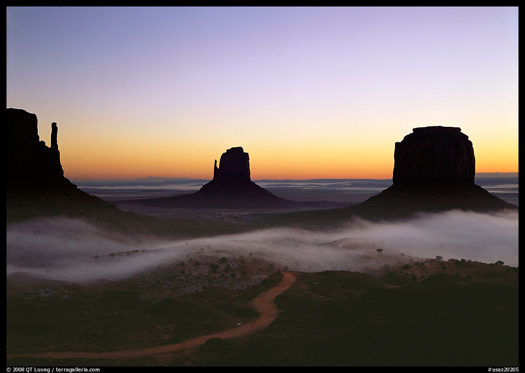 Mittens and fog, sunrise. Monument Valley Tribal Park, Navajo Nation, Arizona and Utah, USA
