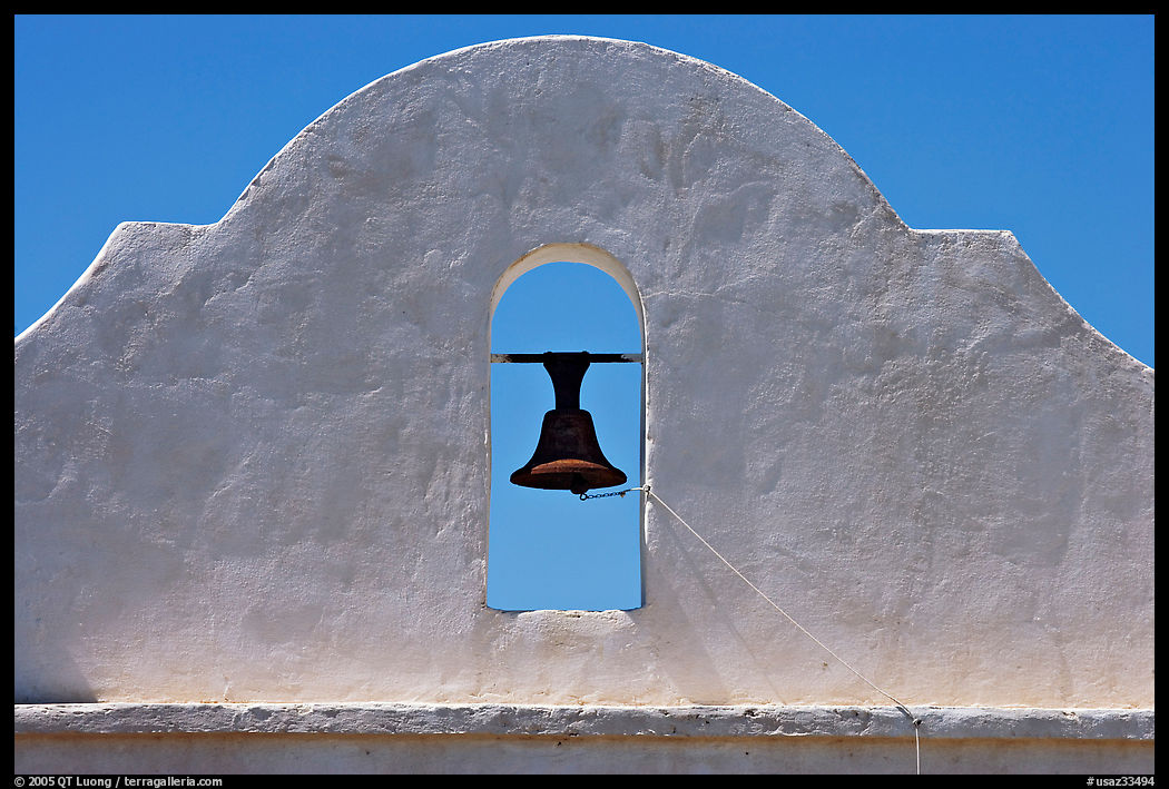 Bell and whitewashed wall, San Xavier del Bac Mission. Tucson, Arizona, USA