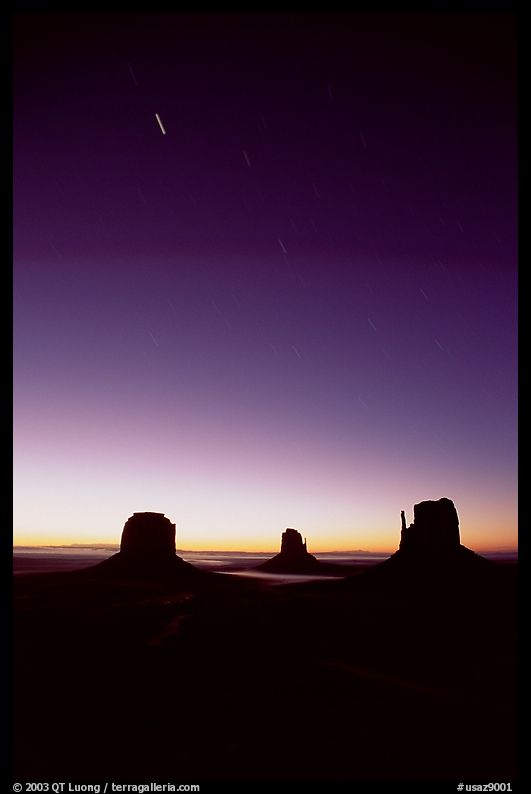 Buttes at dawn with short start trails. Monument Valley Tribal Park, Navajo Nation, Arizona and Utah, USA