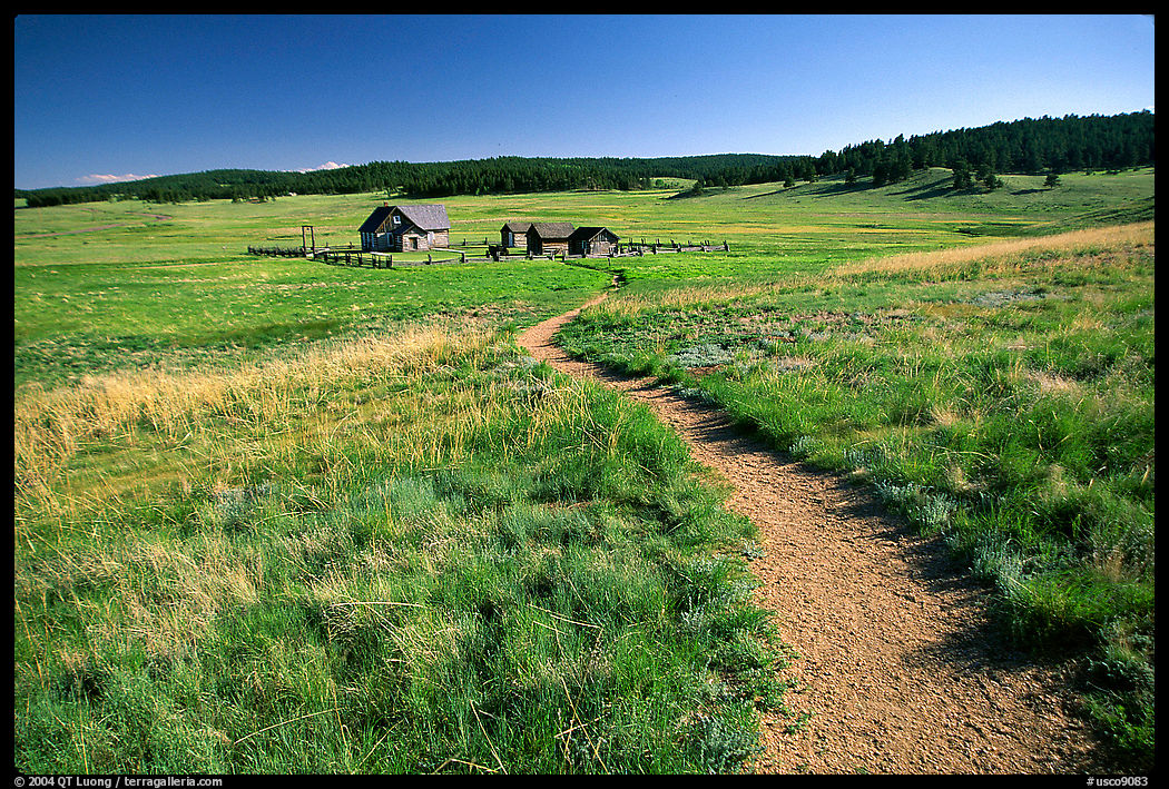 Trail and historic barns,  Florissant Fossil Beds National Monument. Colorado, USA
