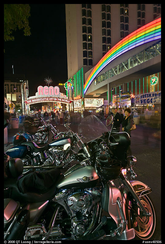 Harley-Davidson motorcycles on downtown street at night. Reno, Nevada, USA