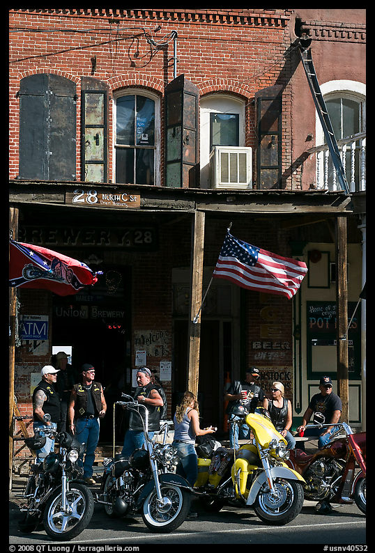 Motorcycles parked in front of brick historic building. Virginia City, Nevada, USA