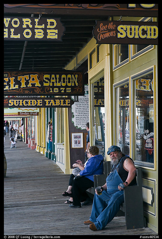 Arcade with suicide table sign. Virginia City, Nevada, USA