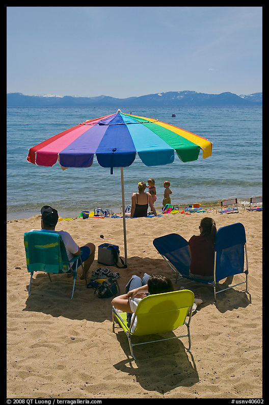Beach unbrella and family, Sand Harbor, Lake Tahoe-Nevada State Park, Nevada. USA