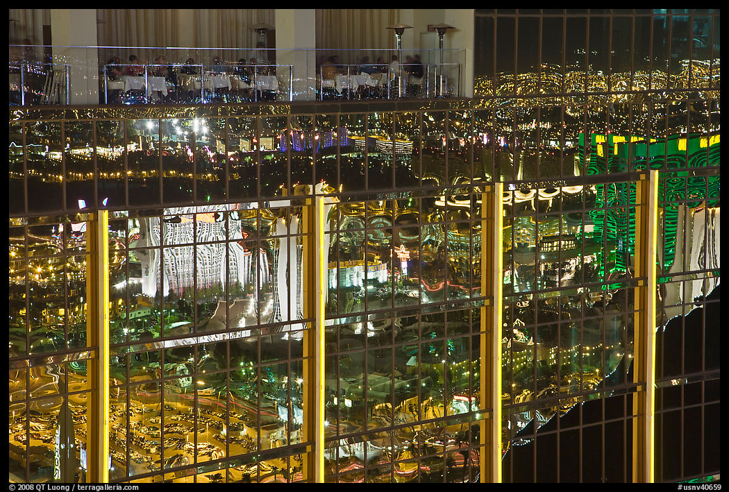 Restaurant and city reflections on glass windows, the Hotel at Mandalay Bay. Las Vegas, Nevada, USA