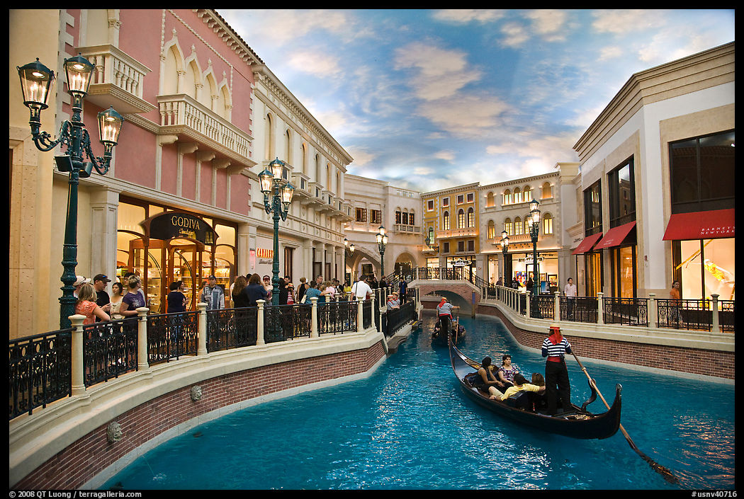 Gondolas and Grand Canal bordered by shops in the Venetian casino. Las Vegas, Nevada, USA