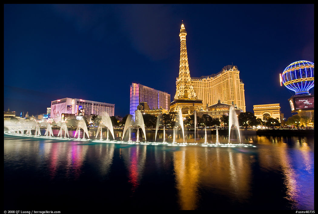 Paris casino and Bellagio fountains by night. Las Vegas, Nevada, USA