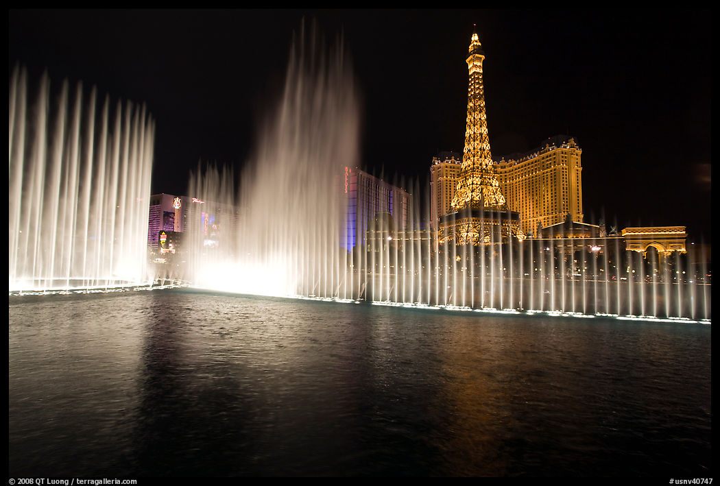 Bellagio fountains and Paris hotel by night. Las Vegas, Nevada, USA