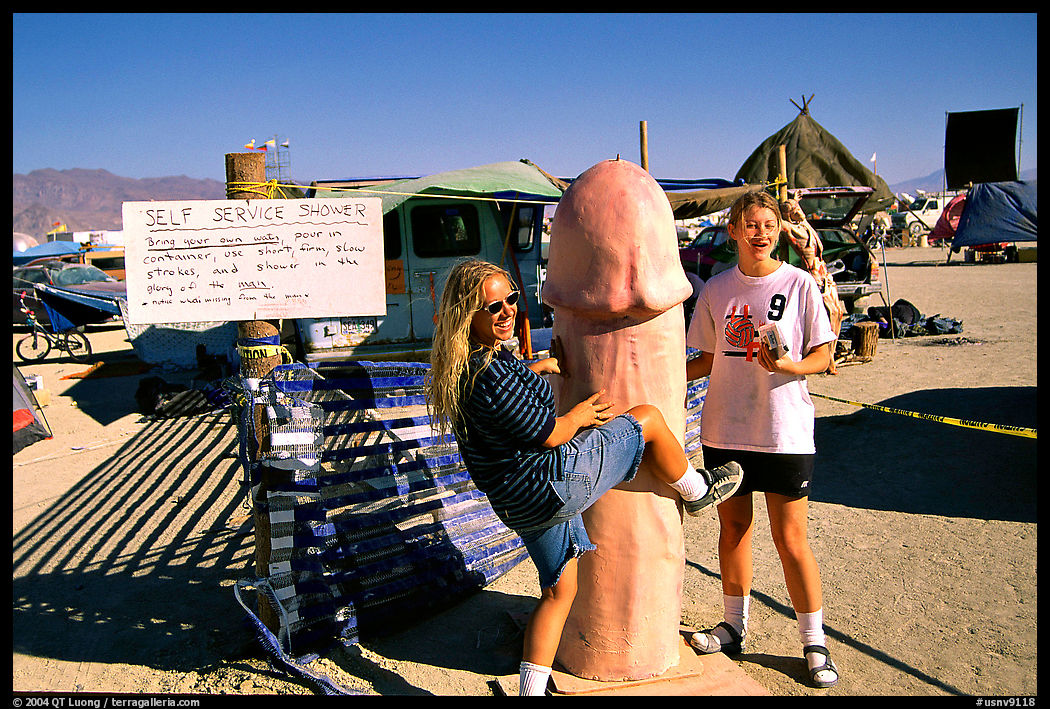 Phallic shower during the Burning Man festival. Nevada, USA