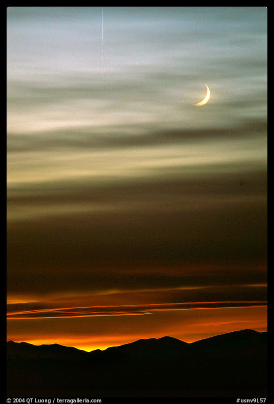 Crescent moon and mountain range. Nevada, USA