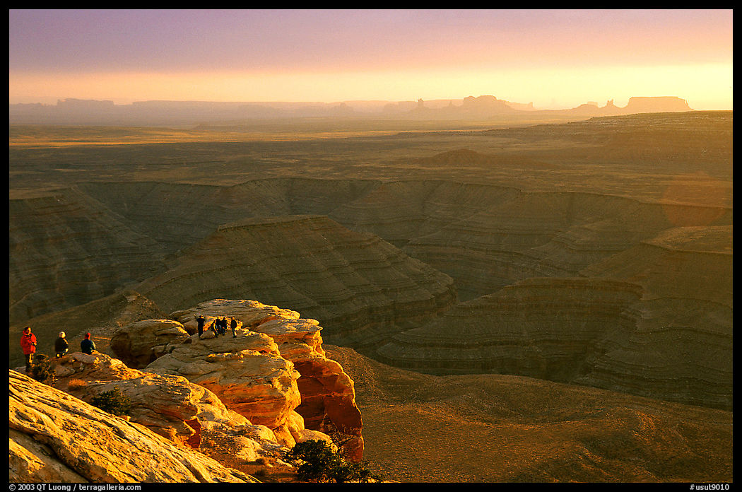 Watching the sunset over the San Juan River, Monument Valley in the background. Utah, USA