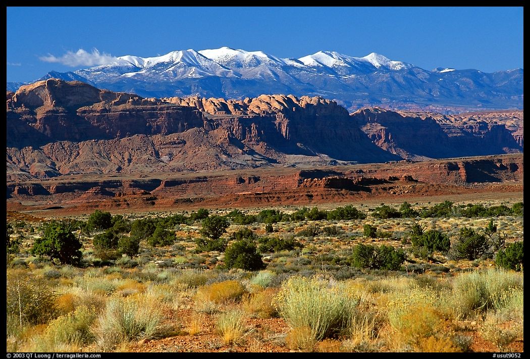 Sandstone cliffs and Henry mountains. Utah, USA