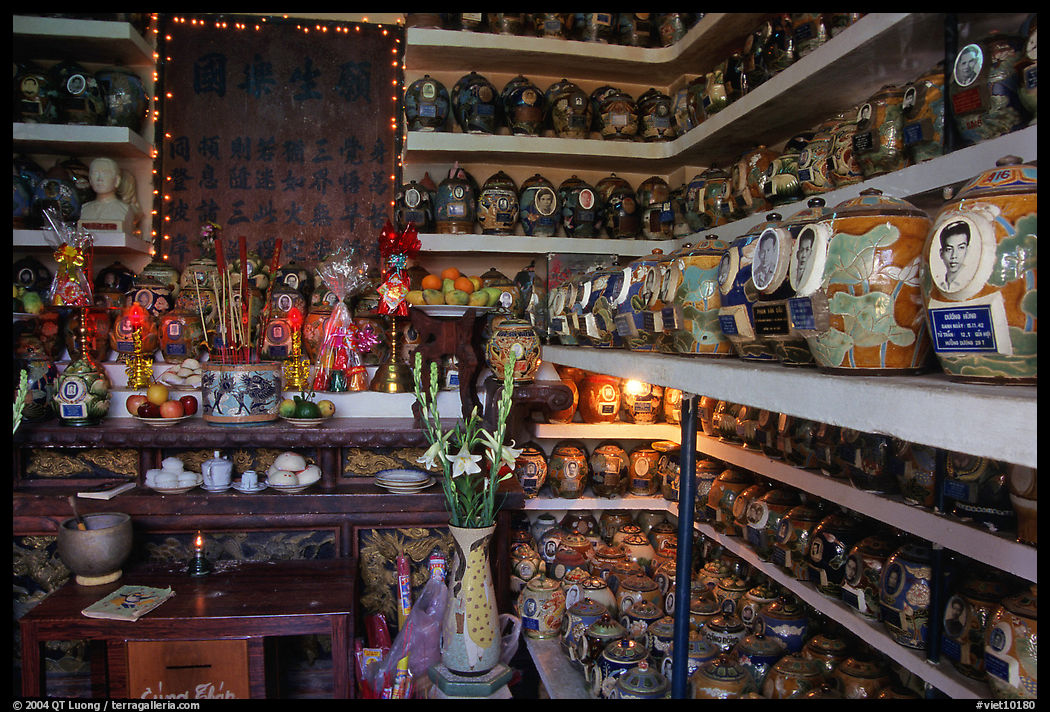 Temple room containing funeral urns with ashes of the deceased. Ho Chi Minh City, Vietnam