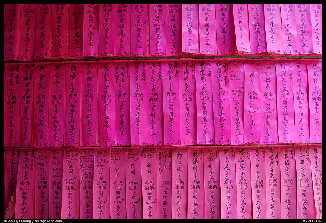 Prayer labels with names written in Chinese characters. Ho Chi Minh City, Vietnam