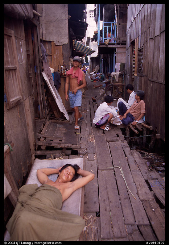 Sleeping late in a narrow alley. Ho Chi Minh City, Vietnam