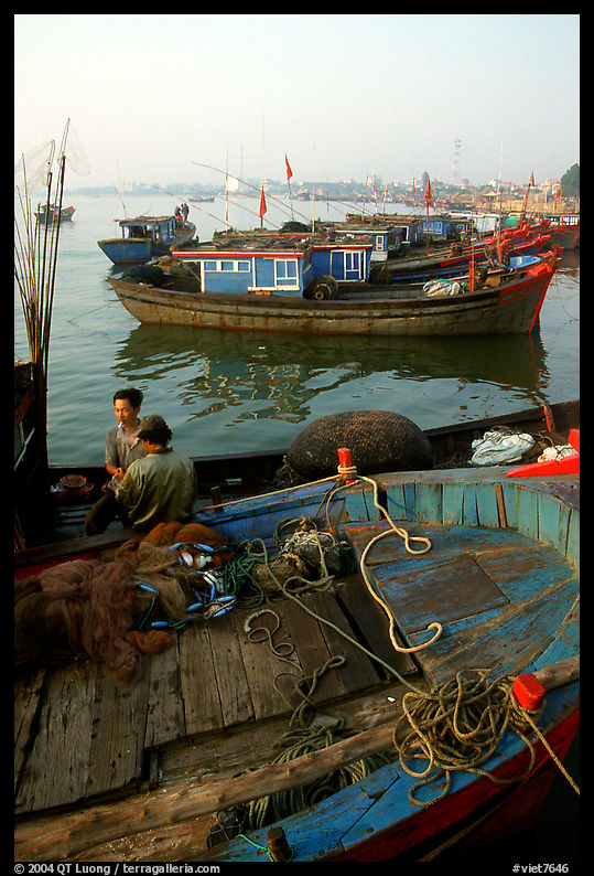 Fisherman relax in a boat, Dong Hoi. Vietnam