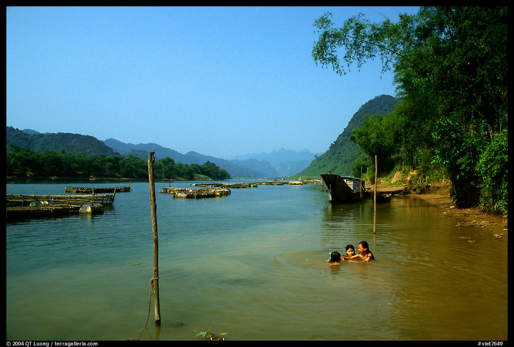River with kids playing, Son Trach. Vietnam