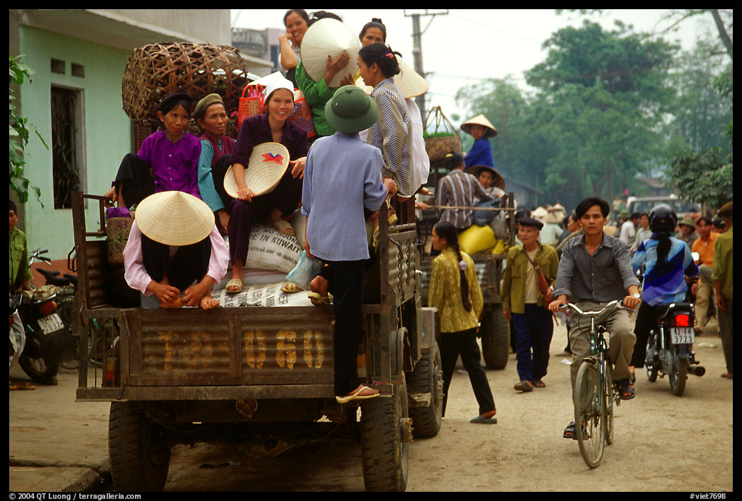 Riding in the back of an overloaded truck. Northest Vietnam