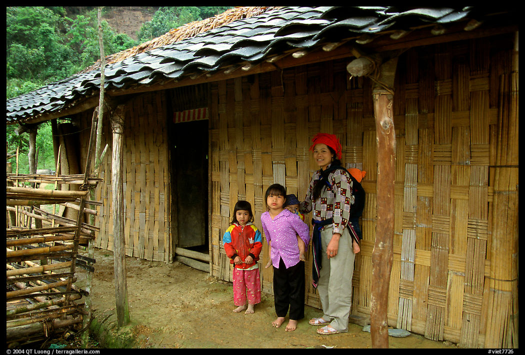 Family outside their home. Northeast Vietnam