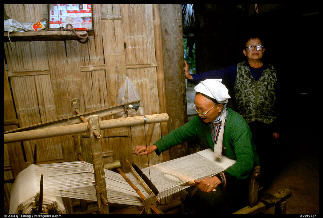Elderly woman weaving in her home. Northeast Vietnam