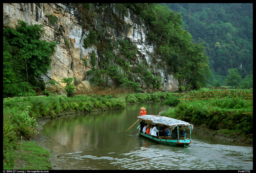 Shallow boats transport villagers to a market. Northeast Vietnam