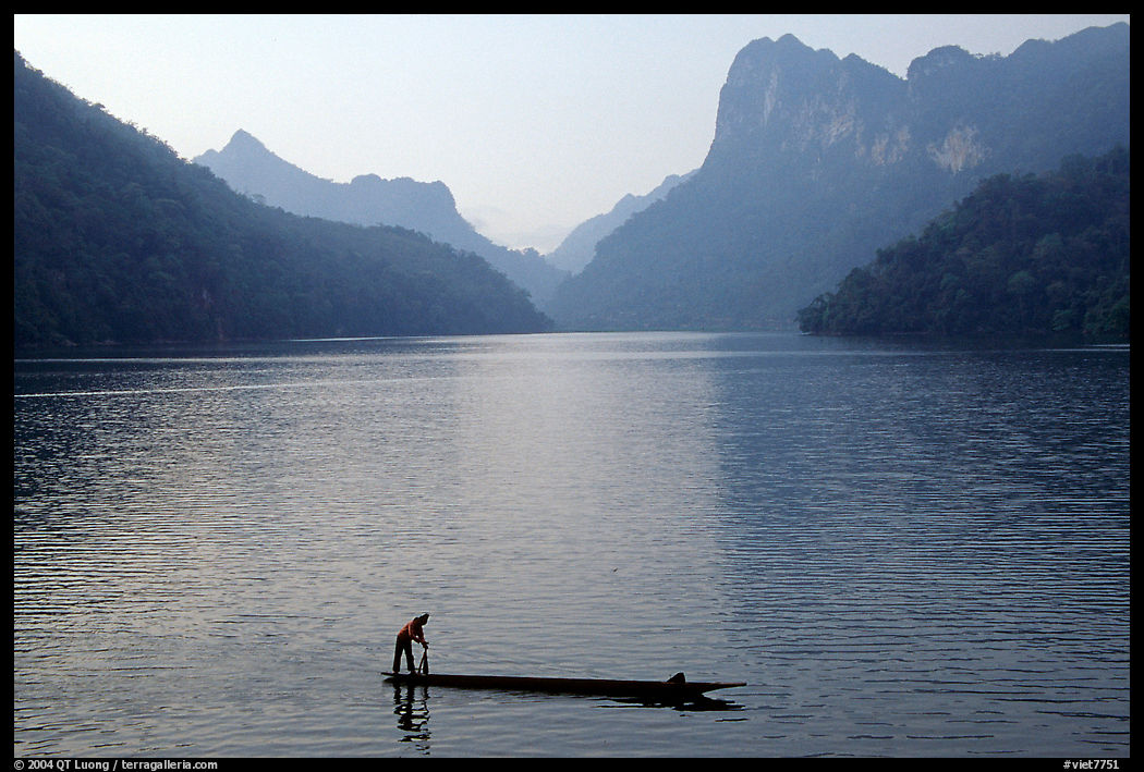 Fisherman on Dugout boat,  Ba Be Lake. Northeast Vietnam