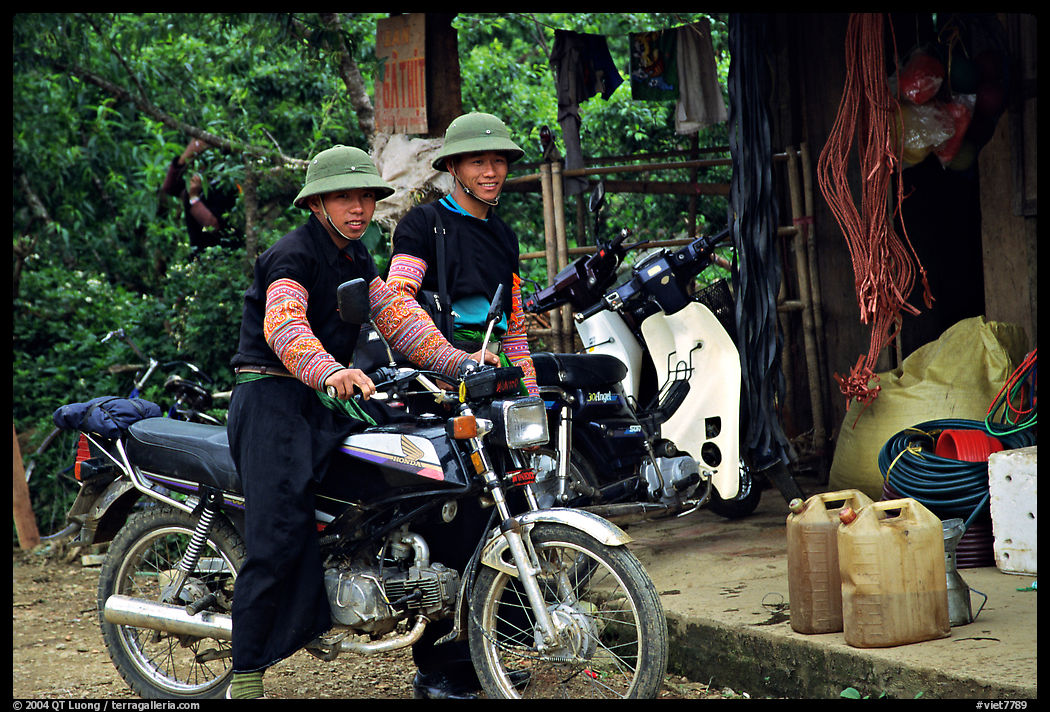 Two Hmong motorcyclists at the Xa Linh market. Northwest Vietnam