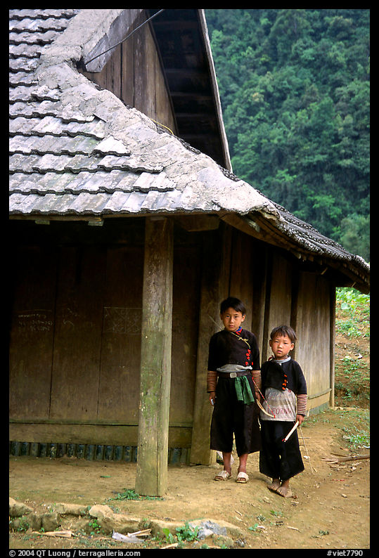 Two Hmong boys outside their house in Xa Linh village. Northwest Vietnam
