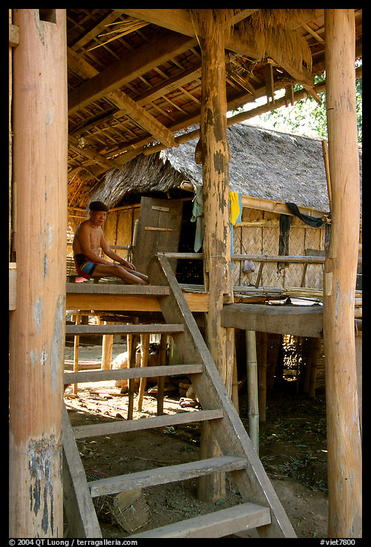 Elderly Montagnard man wearing the French beret on his porch, near Son La. Northwest Vietnam