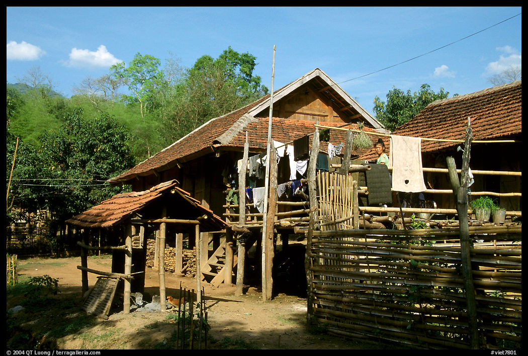 Woman drying laundry in a montagnard village near Son La. Northwest Vietnam