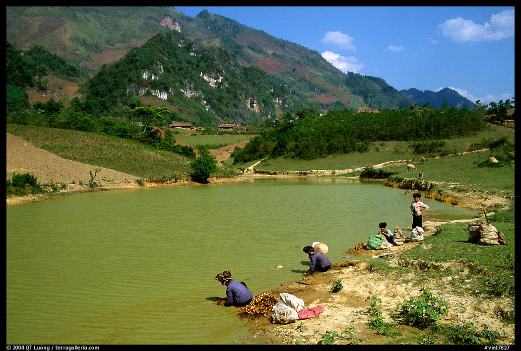 Thai women on the shores of a pond, near Tuan Giao. Northwest Vietnam