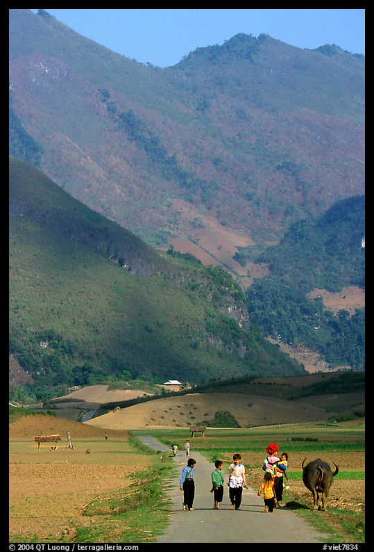 Villagers walking on the road, near Tuan Giao. Northwest Vietnam