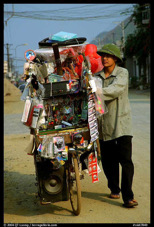 Street vendor uses his bicycle as a shop, Tam Duong. Northwest Vietnam
