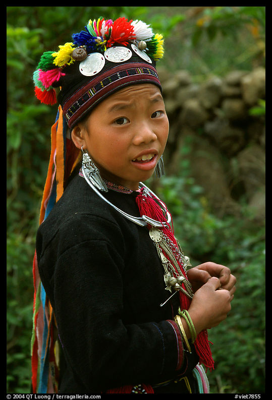 Boy of the Black Dzao minority wearing a hat with three decorative coins, between Tam Duong and Sapa. Vietnam