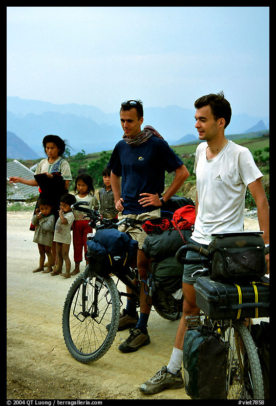 Western adventure travellers on mountain bikes, near Tam Duong. Northwest Vietnam