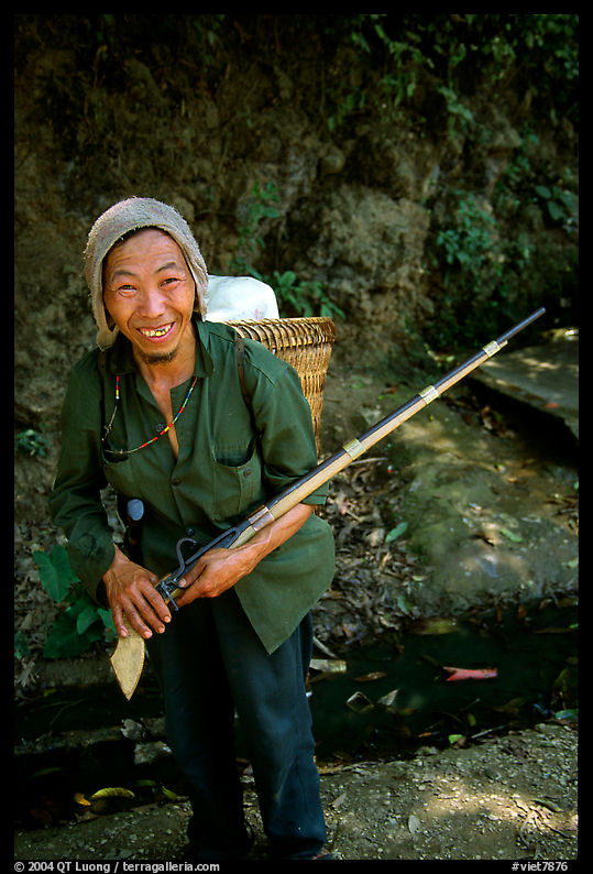 Hunter holding an old rifle, near Lai Chau. Northwest Vietnam