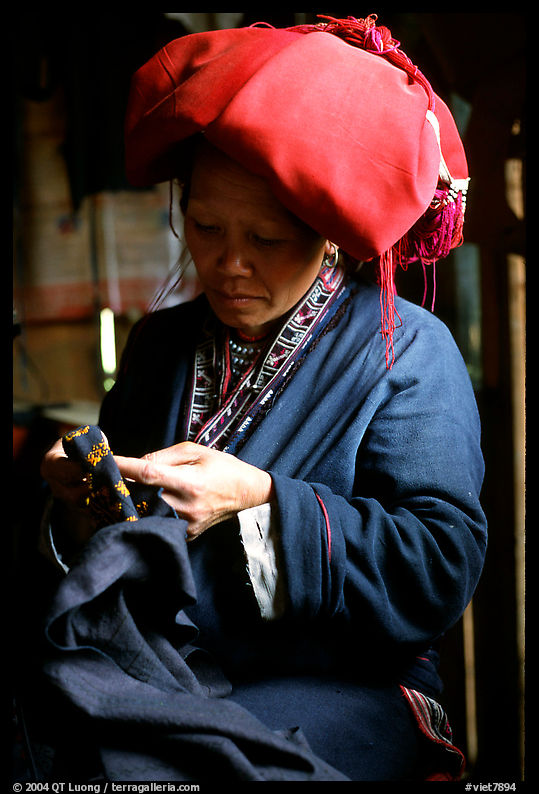 Red Dzao women sewing. Vietnam