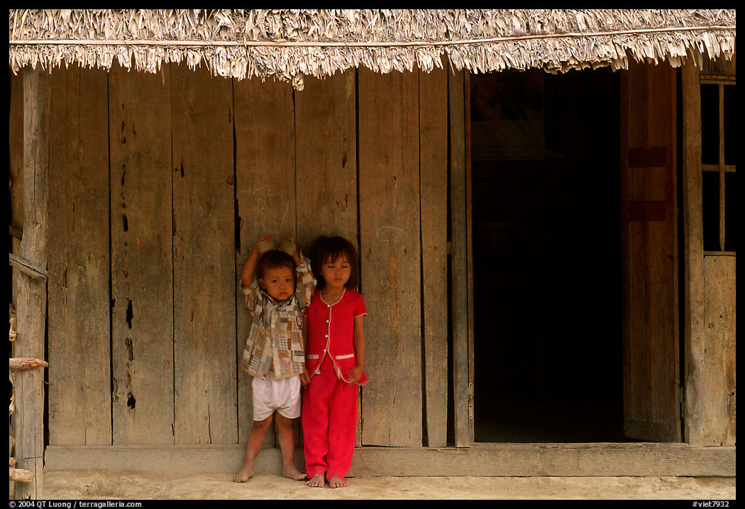 Two kids in front of a hut. Hong Chong Peninsula, Vietnam