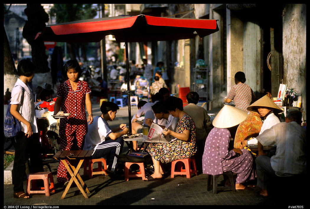 Eating in a street restaurant. Ho Chi Minh City, Vietnam