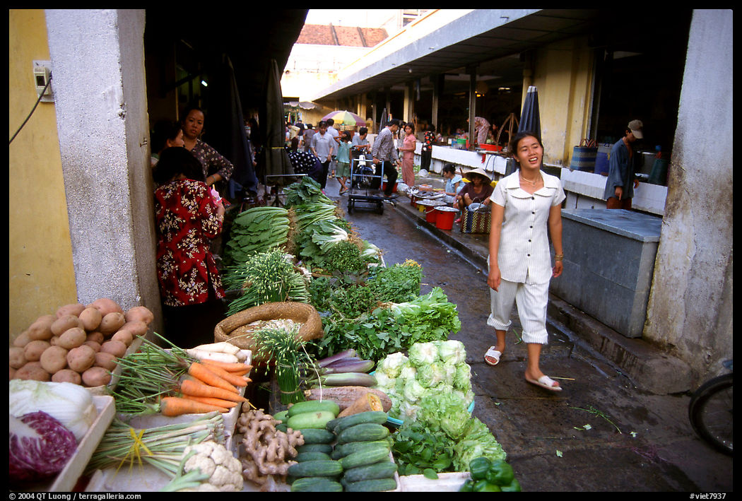 Vegetables for sale in an alley of the Ben Than Market. Ho Chi Minh City , Vietnam
