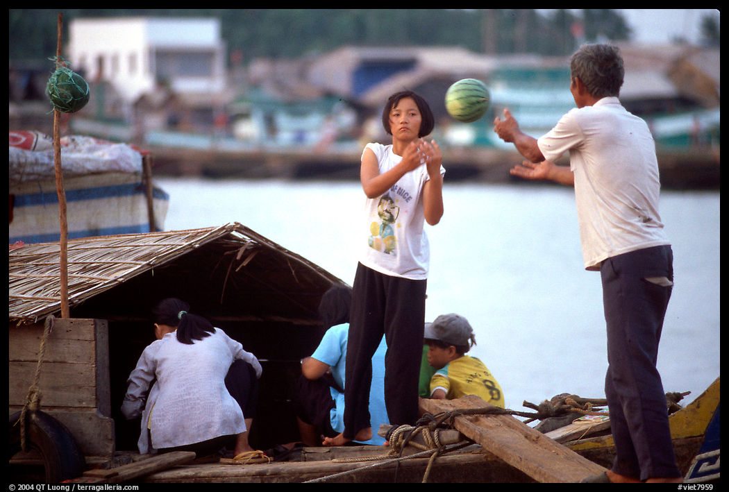 Unloading watermelons from a boat. Ha Tien, Vietnam