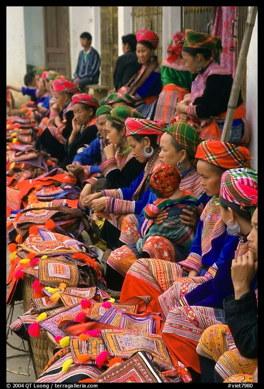 Flower hmong women sell colorful clothing at the market. Bac Ha, Vietnam