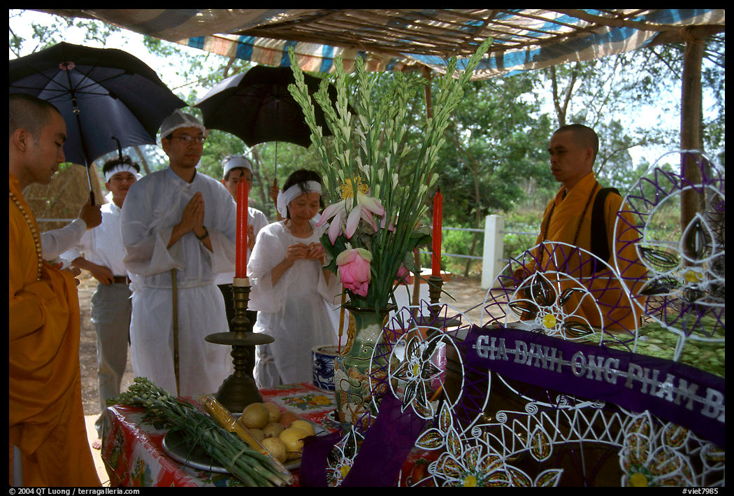 Mourning at a countryside funeral. Mekong Delta region, Vietnam