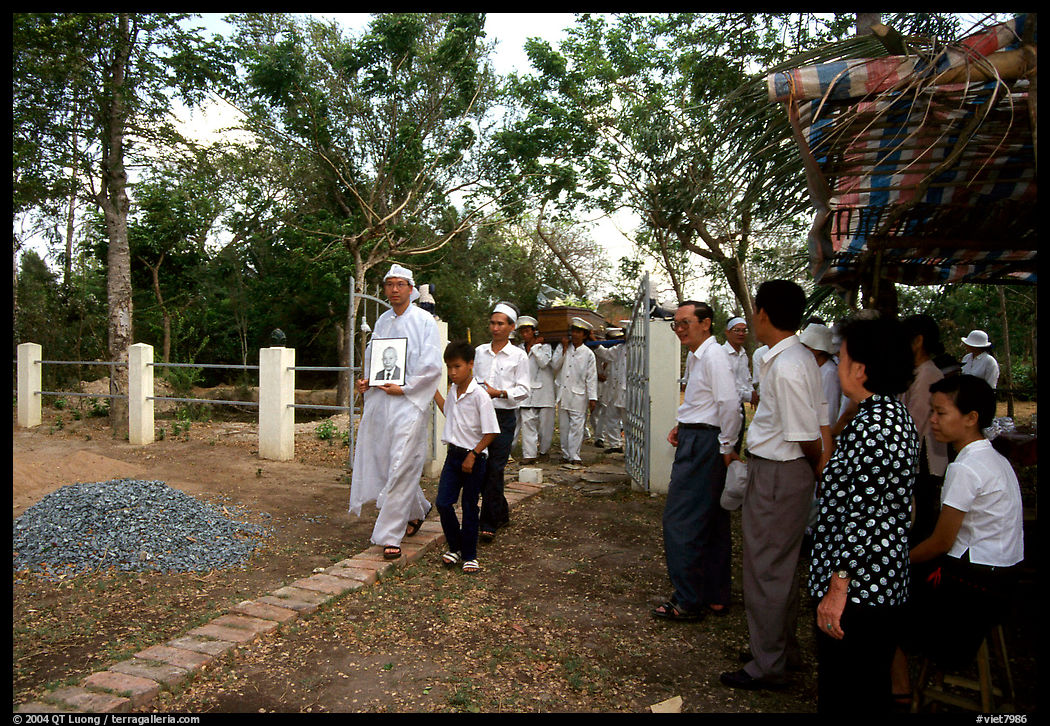 Procession at a countryside funeral. Mekong Delta region, Vietnam