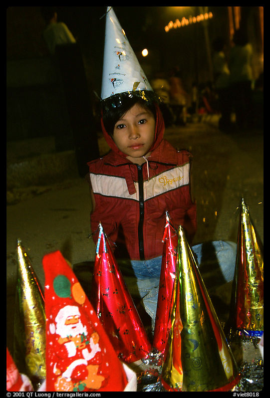 Child on Christmas night. Ho Chi Minh City, Vietnam