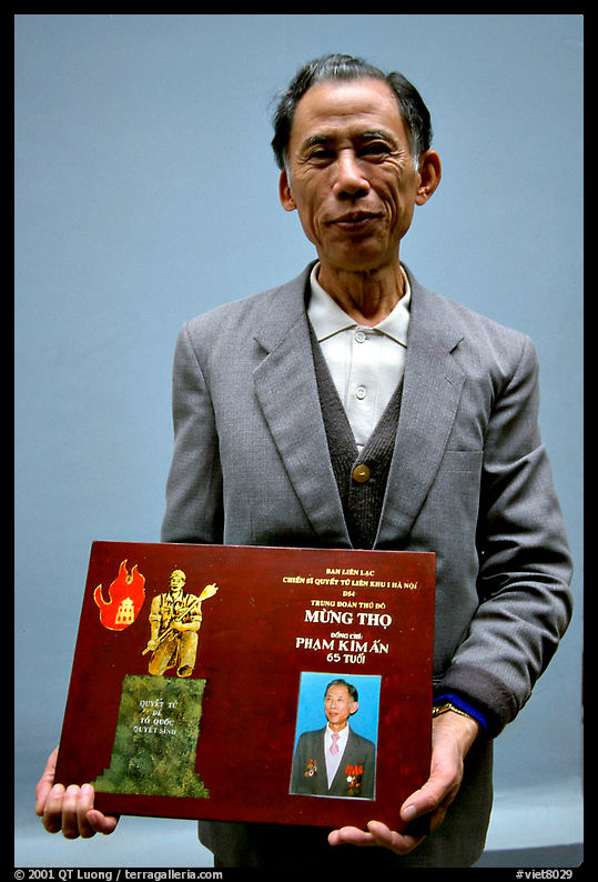 Former militia member with certificate of heroism, Hanoi. Hanoi, Vietnam
