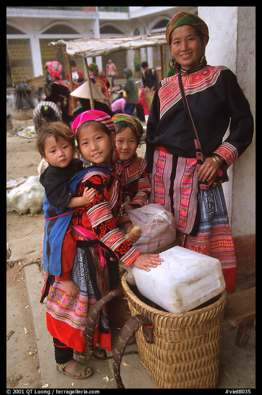 Flower Hmong mother with daughters. Bac Ha, Vietnam