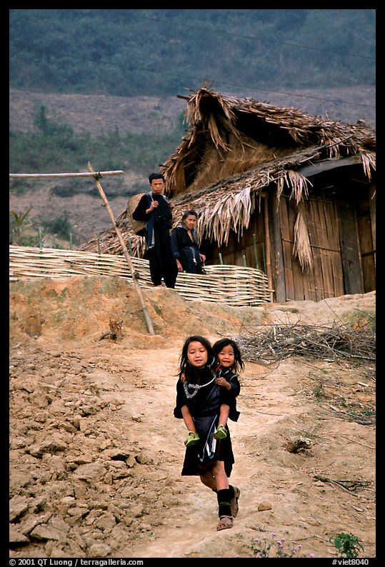 Black Hmong girl and family. Sapa, Vietnam