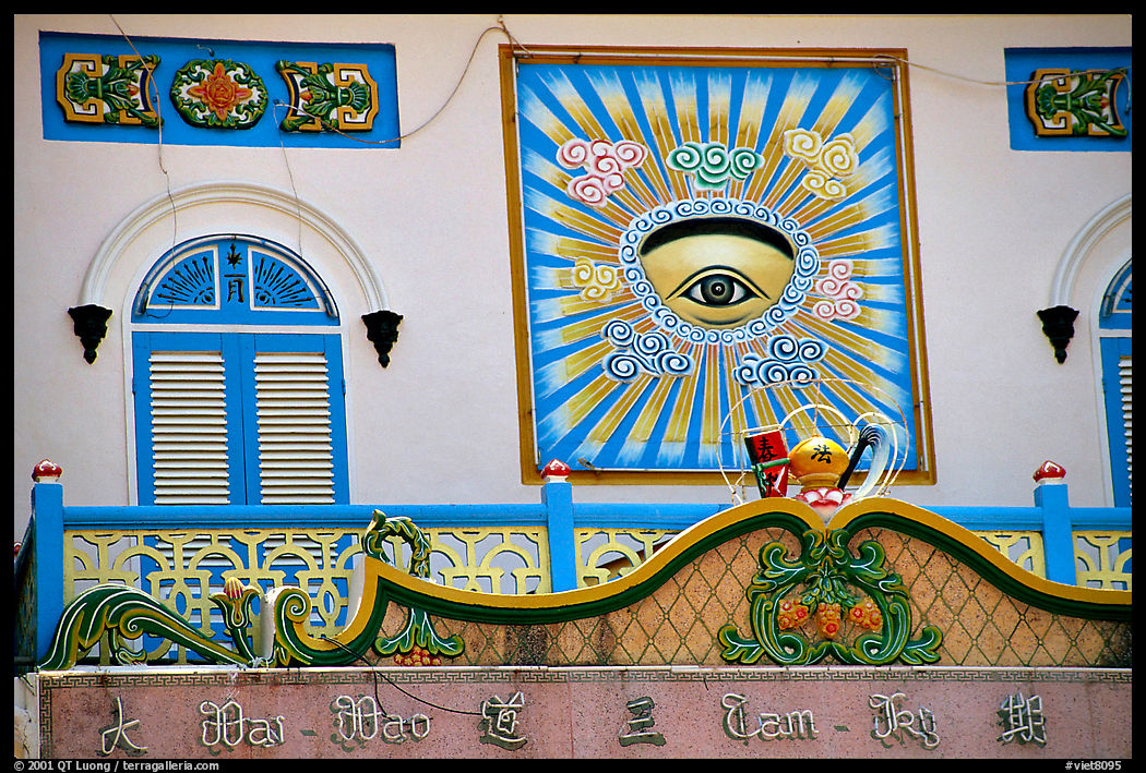 The Cao Dai is a syncretic religion forged in the 20s. It's most noteworthy symbol is the all seeing  eye. Detail of the great temple. Tay Ninh, Vietnam