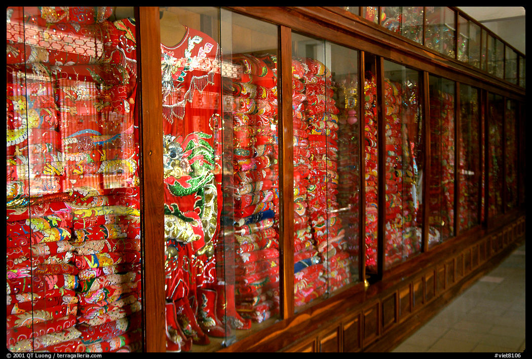 Gold-embroided dresses offered to Lady Chua Xu,. Chau Doc, Vietnam